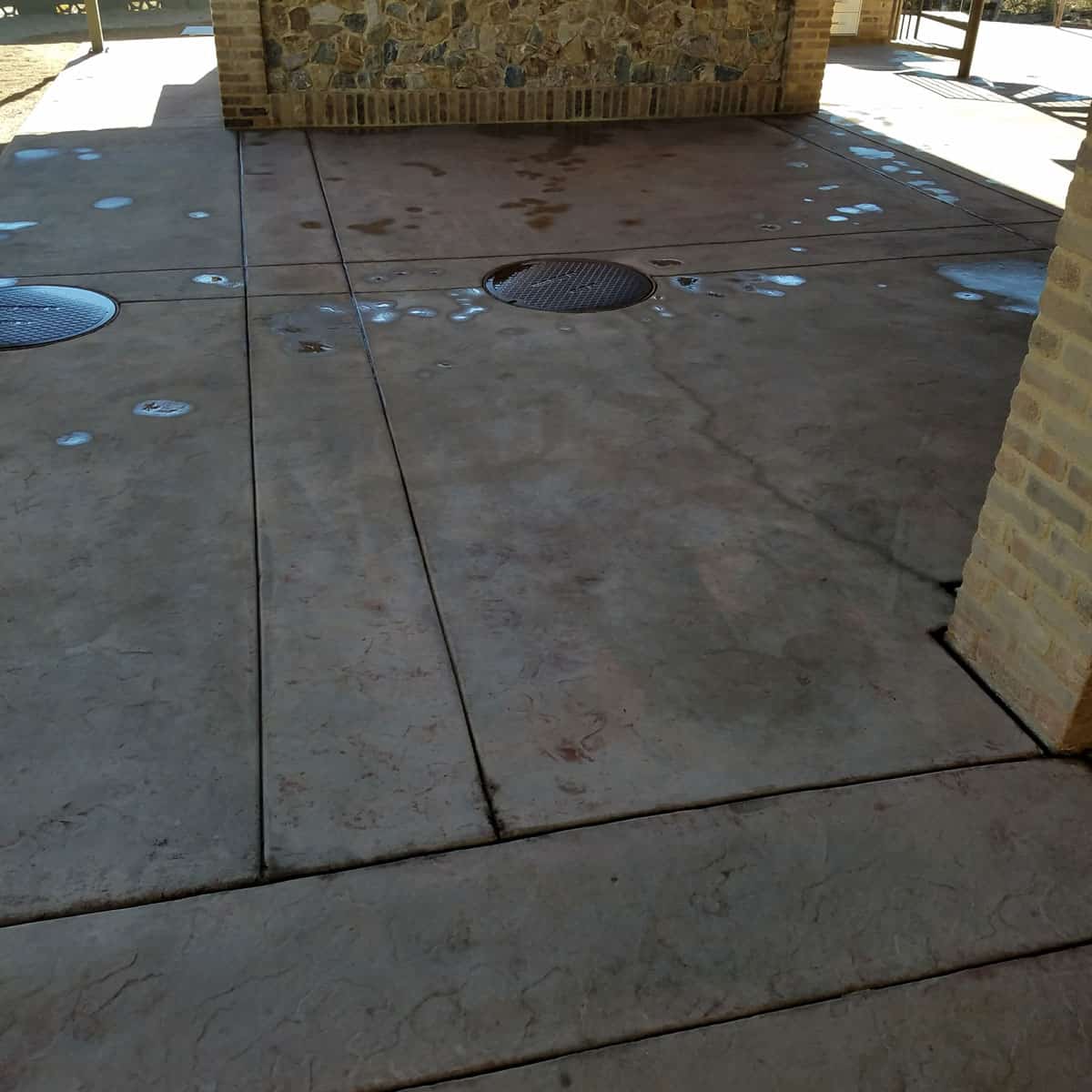 Before and after comparison of concrete paver sealing