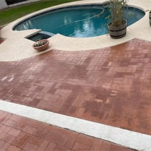 Detailed view of paver pressure washing
