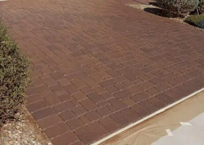 Sealed and clean driveway pavers after professional cleaning and sealing